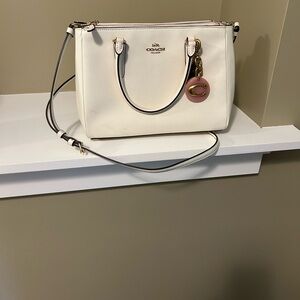 Bone colored Coach purse. Used only a couple times. 11.5 x 9.5 x 3.5